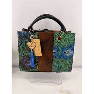 Artesanal handbag with genuine fur appliqués and hand-painted details.